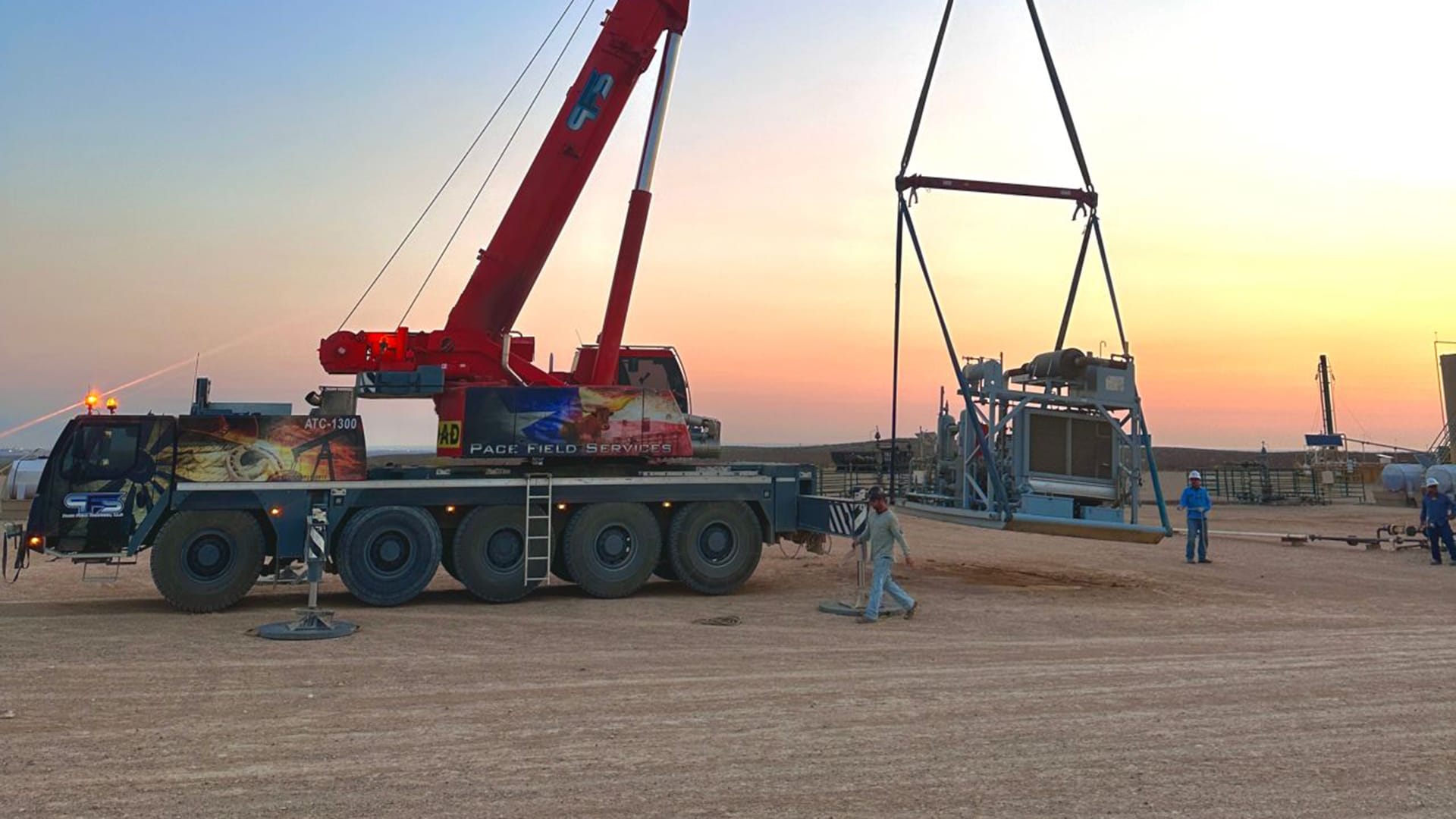 Crane using Bigfoot Outrigger Pads after calculating Ground Bearing Pressure for stability
